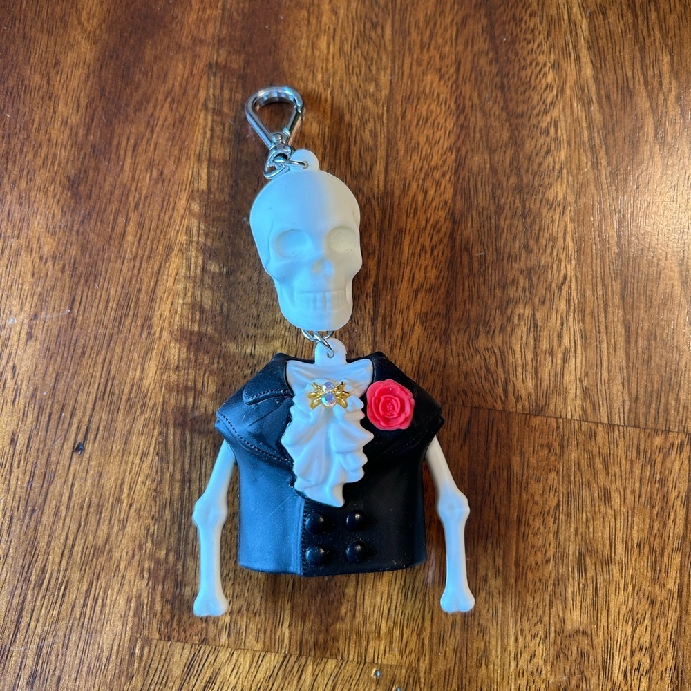 Skeleton PocketBac with Black Jacket and Red Rose